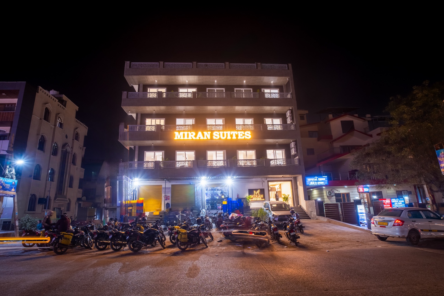 Miran Hotels & Suites facade at night